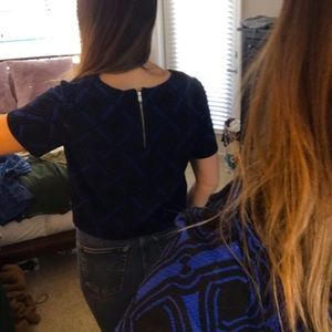 Black and blue patterned top